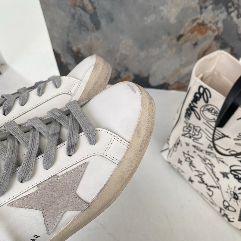 golden goose men’s S*per-star sneakers with suede star and grey heel tab