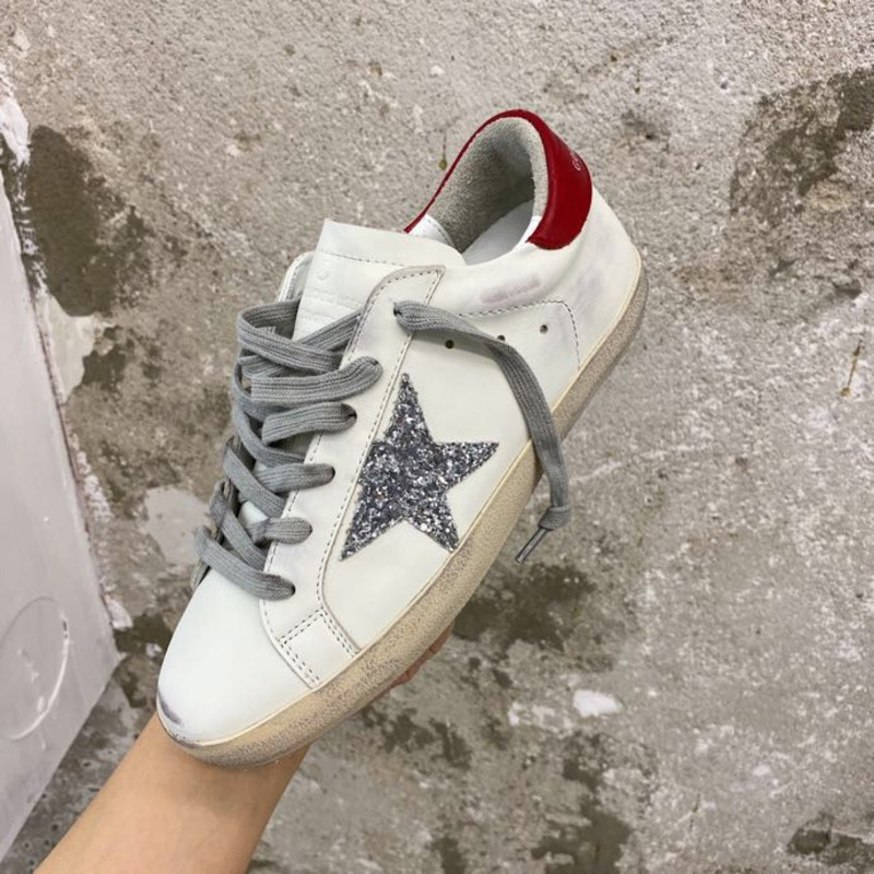 golden goose S*per-star sneakers with sliver star and red heel tab