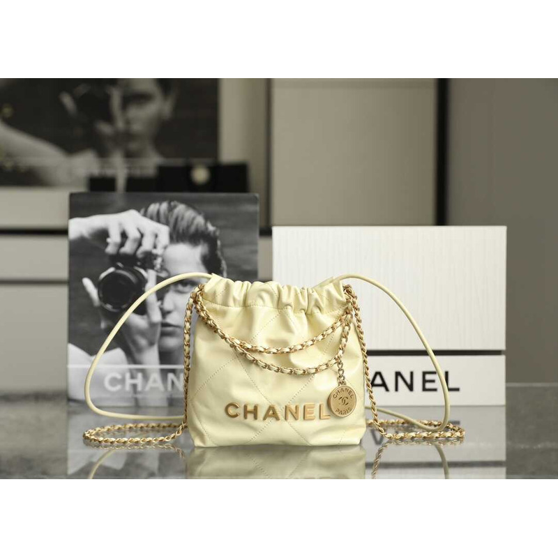 Ch*el 22 mini handbag shiny calfskin & gold-tone metal light yellow