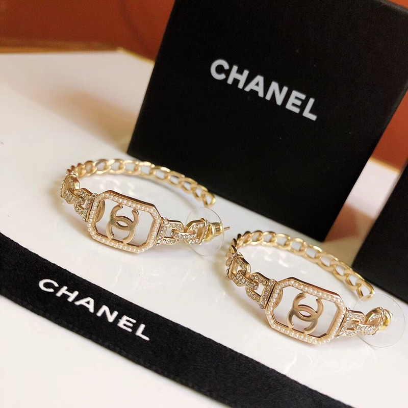 ch*el Di*m*nd metal earrings