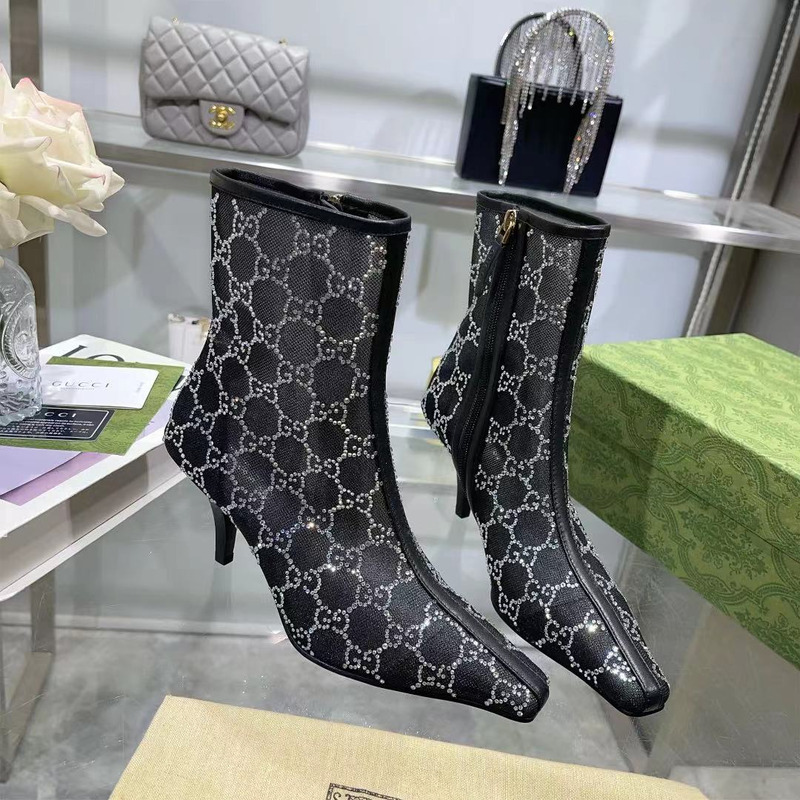 G*u*i women`s gg mid-heel black boot