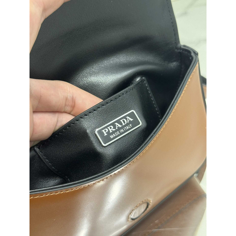 Pra*a brushed leather mini-bag with shoulder strap  brown