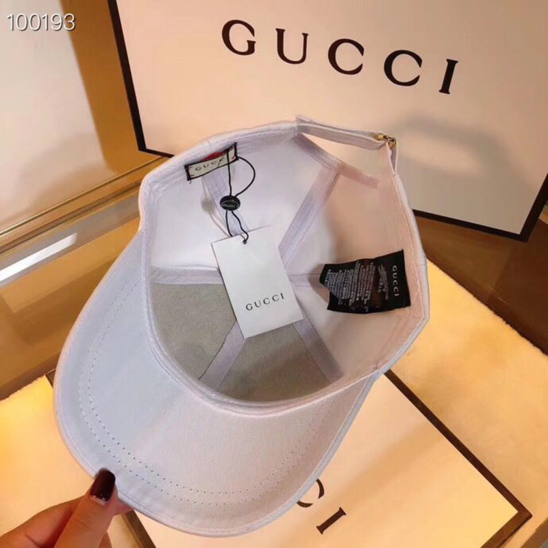 G*u*i baseball hat